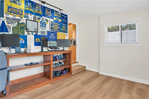 a room with furniture and cabinets