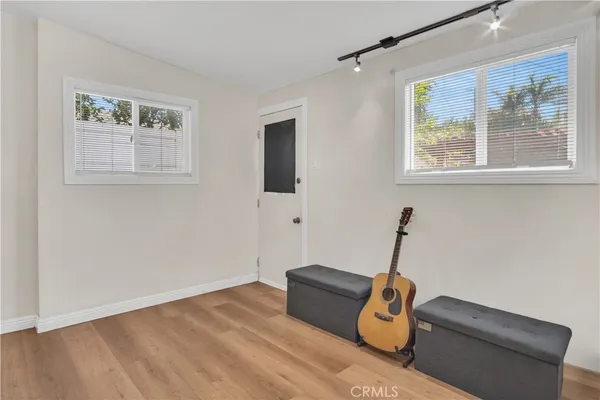 a room with furniture and a window