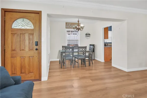 a view of a livingroom with furniture and wooden floor