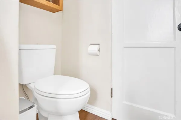 a bathroom with a toilet and a bathtub