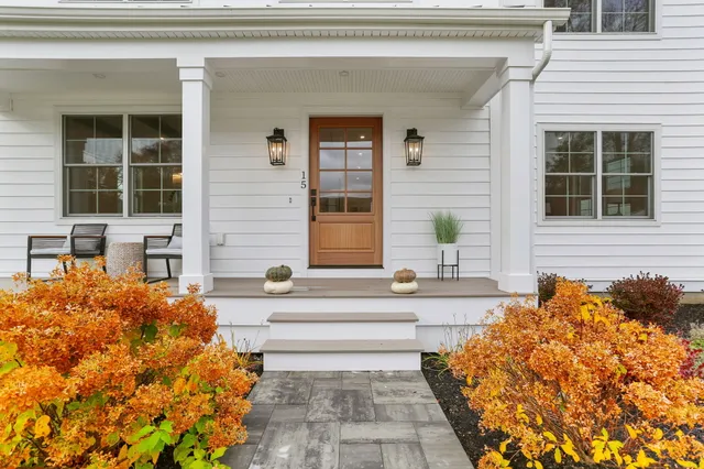 a front view of a house with a outdoor space