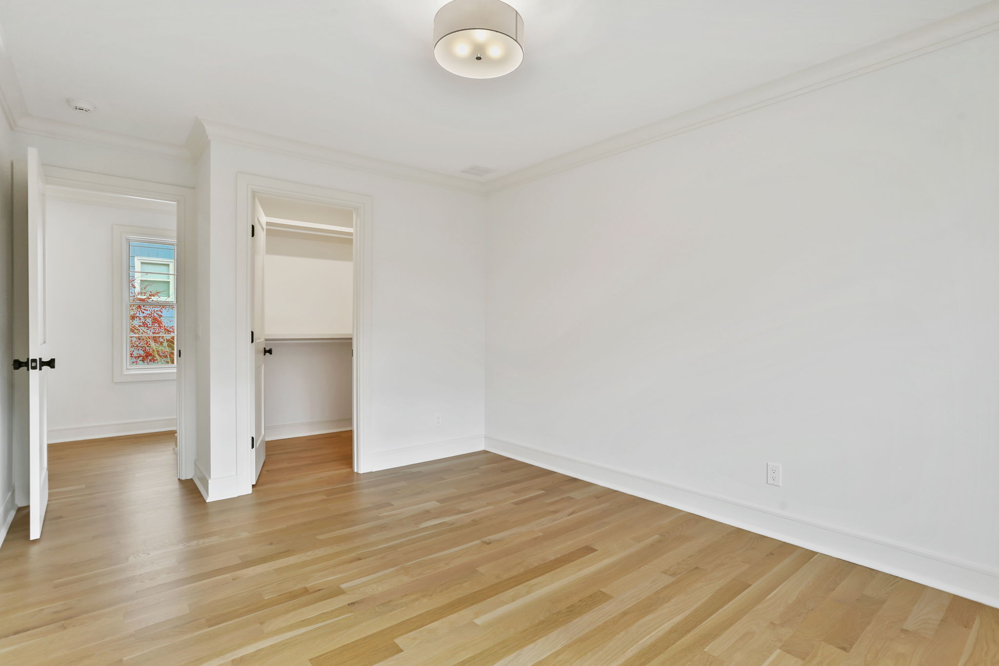 15 Barton Road Fairfield, CT 06824 - Photo 29 of 39 a view of empty room with wooden floor