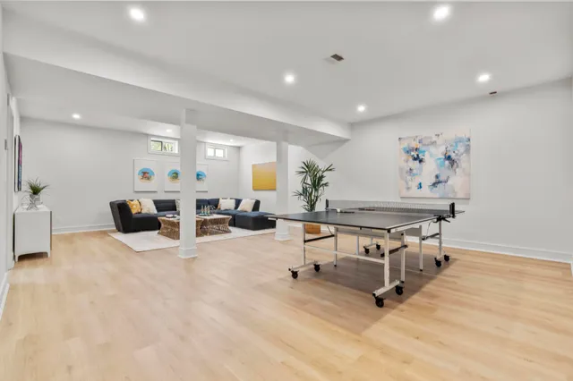 a living room with furniture and a table