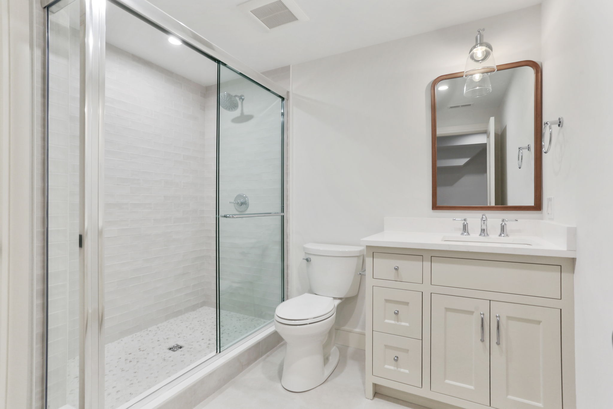 15 Barton Road Fairfield, CT 06824 - Photo 33 of 39 a bathroom with a toilet sink shower and mirror