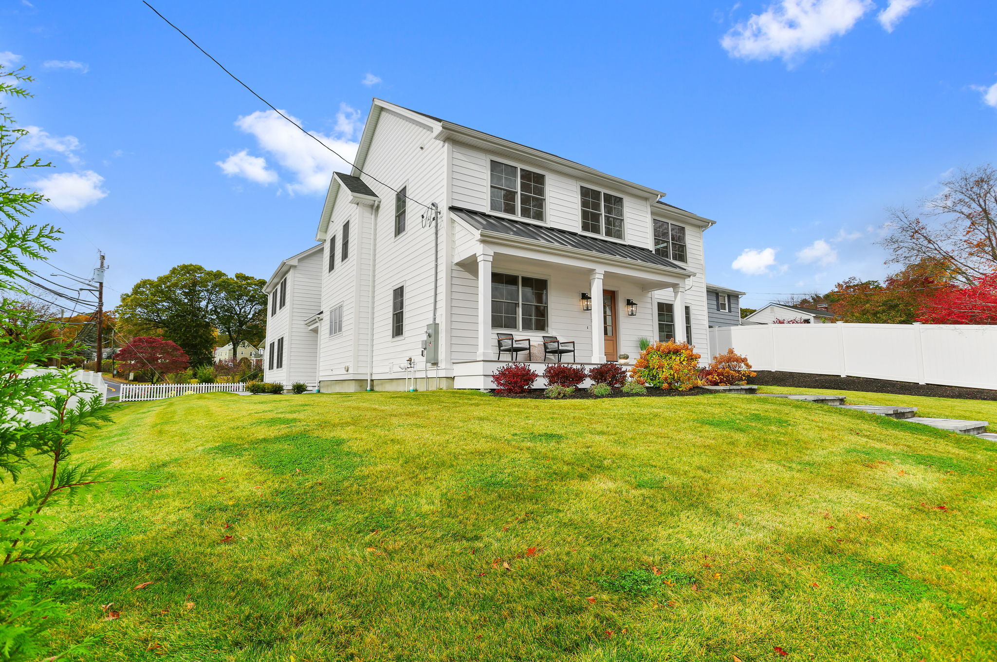 15 Barton Road Fairfield, CT 06824 - Photo 34 of 39 a view of a house with a backyard