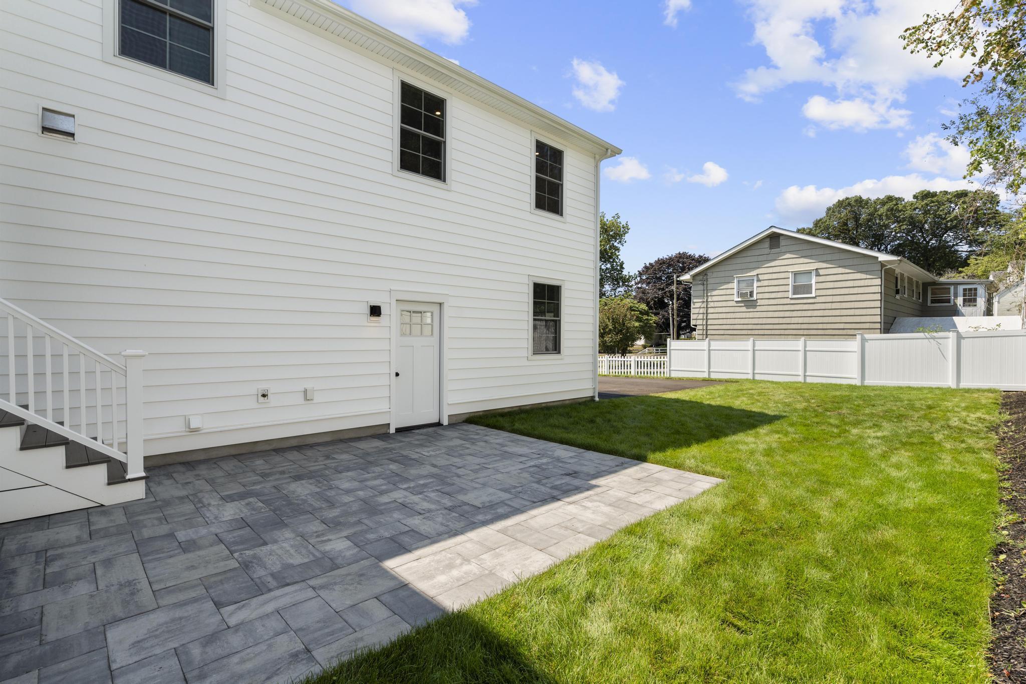 15 Barton Road Fairfield, CT 06824 - Photo 36 of 39 a view of a backyard of the house