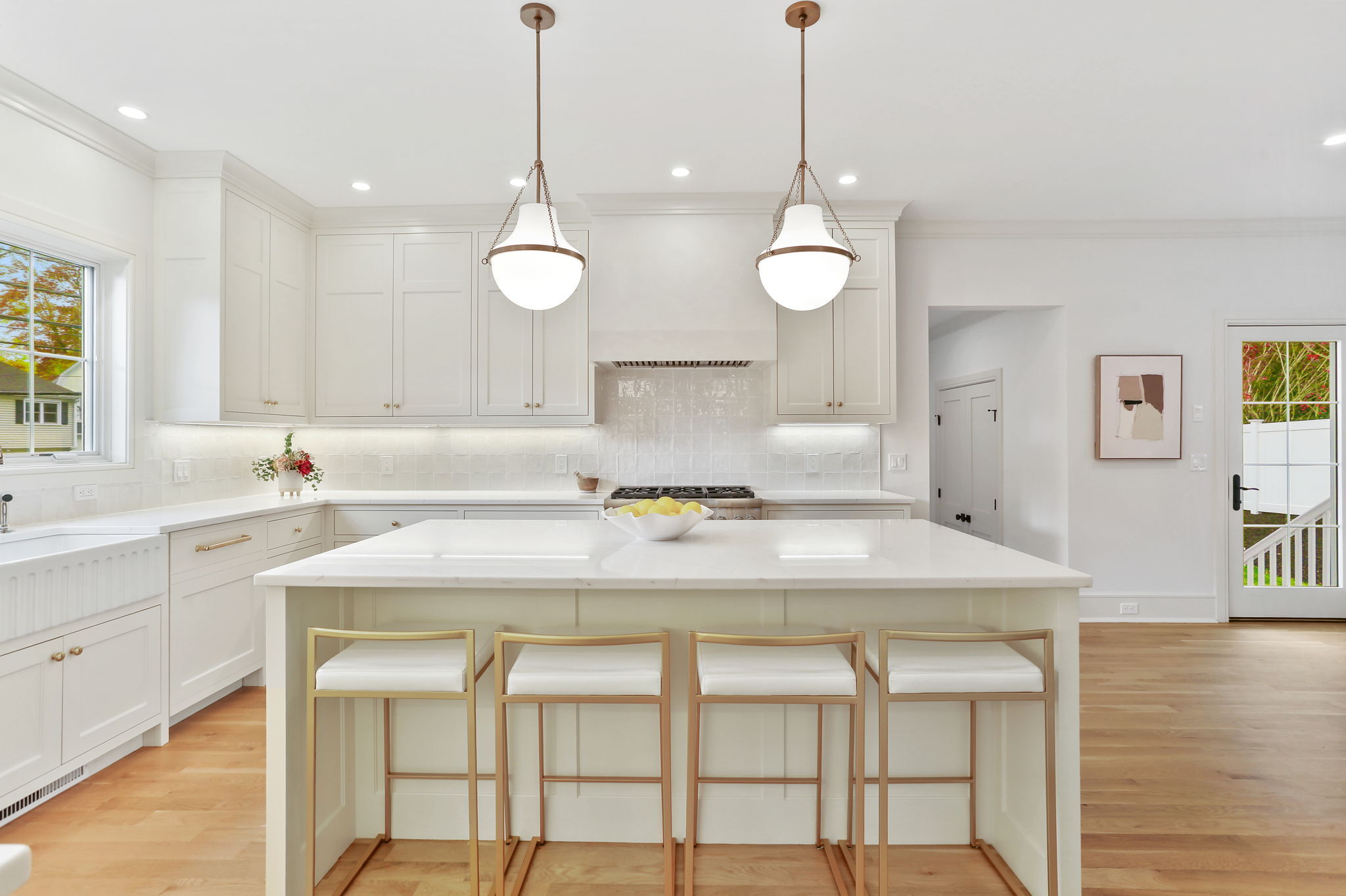 15 Barton Road Fairfield, CT 06824 - Photo 8 of 39 a kitchen with a table and chairs in it