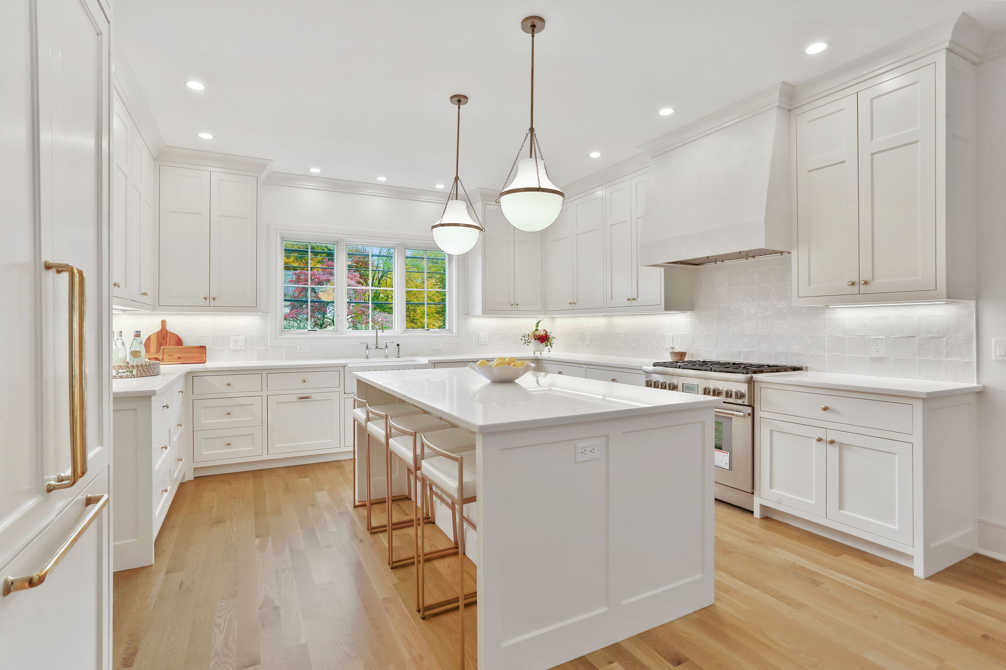 15 Barton Road Fairfield, CT 06824 - Photo 9 of 39 a kitchen with a sink window and cabinets