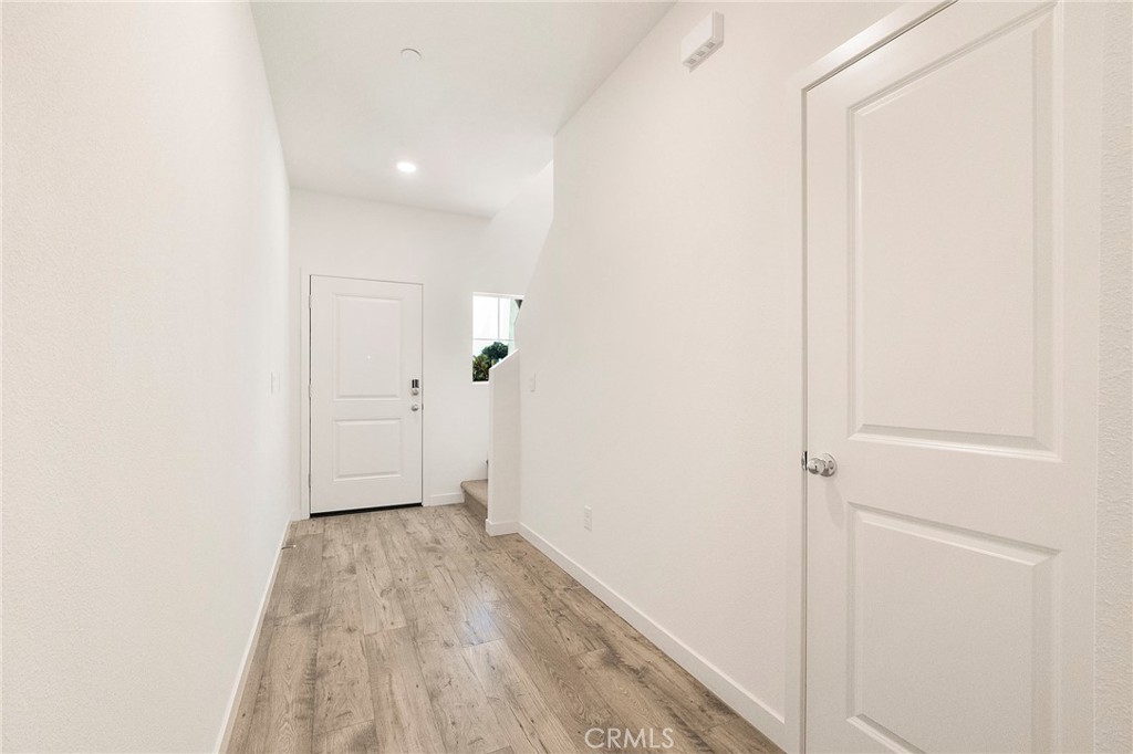 881 Bertino Place Chico, CA 95973 - Photo 8 of 55 a view of hallway with wooden floor