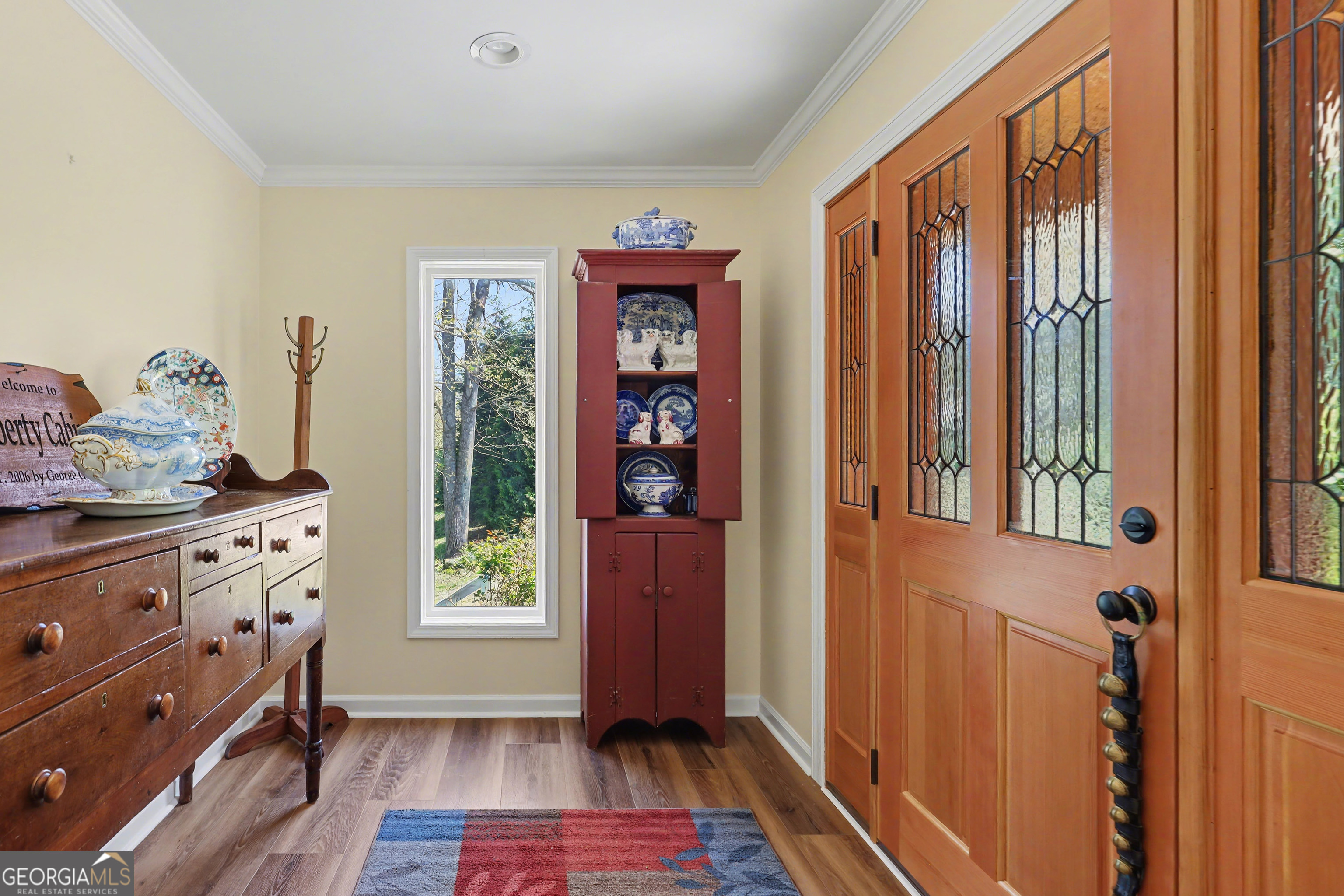 1067-o V Ov Justus Road Rabun Gap, GA 30568 - Photo 13 of 73 a view of an entryway with wooden floor and door