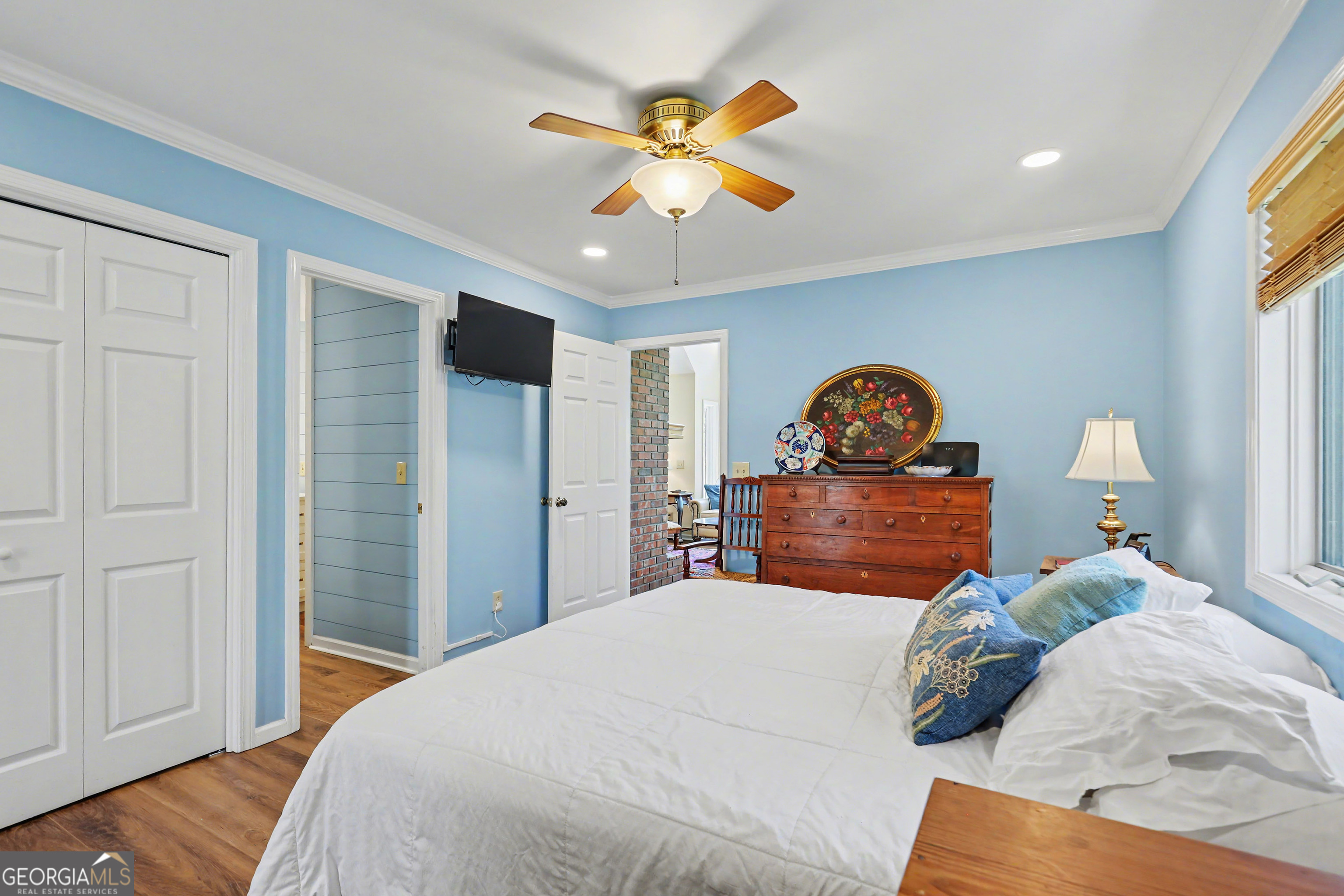 1067-o V Ov Justus Road Rabun Gap, GA 30568 - Photo 30 of 73 a bedroom with a bed and a chandelier