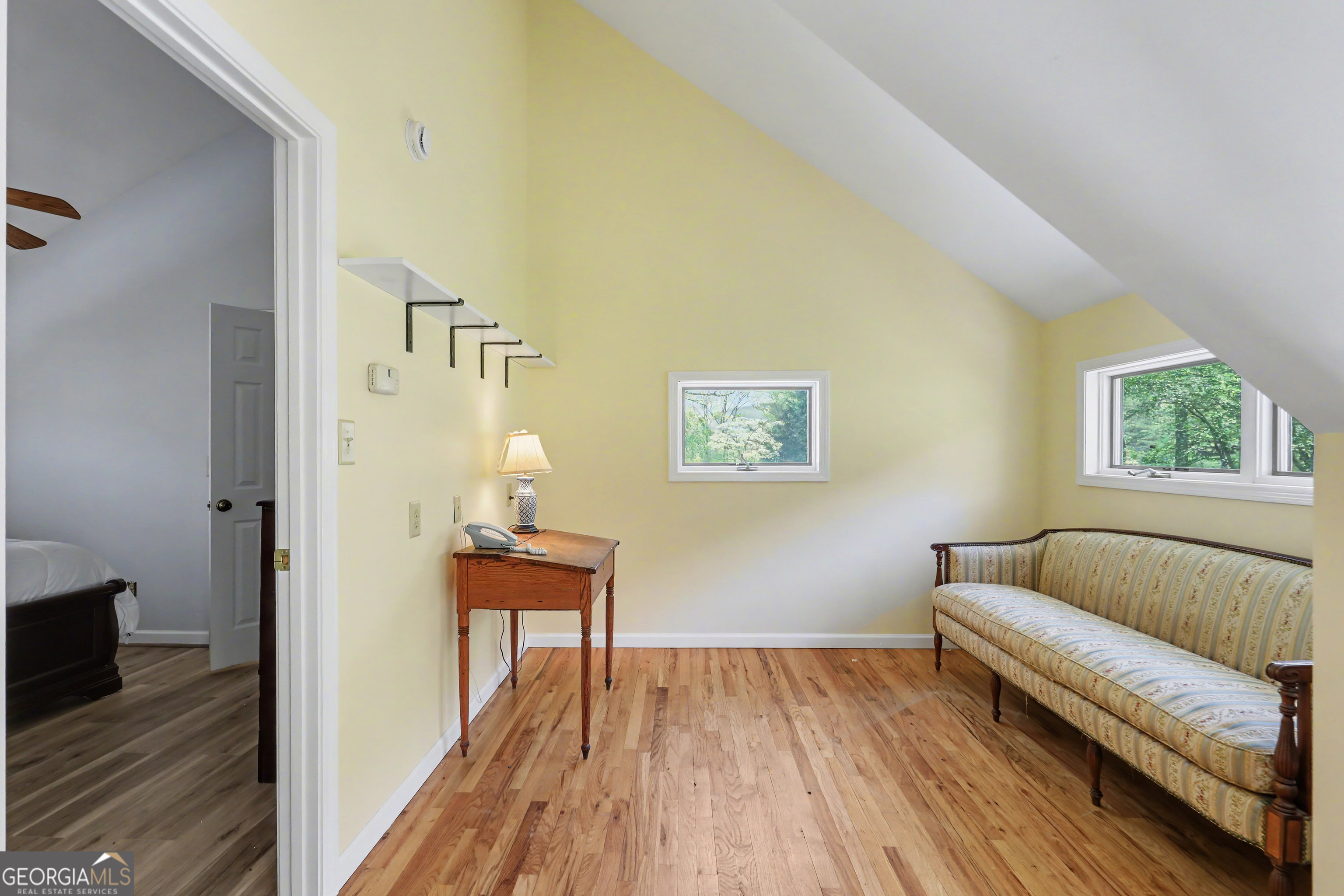 1067-o V Ov Justus Road Rabun Gap, GA 30568 - Photo 40 of 73 a bedroom with a bed and wooden floor