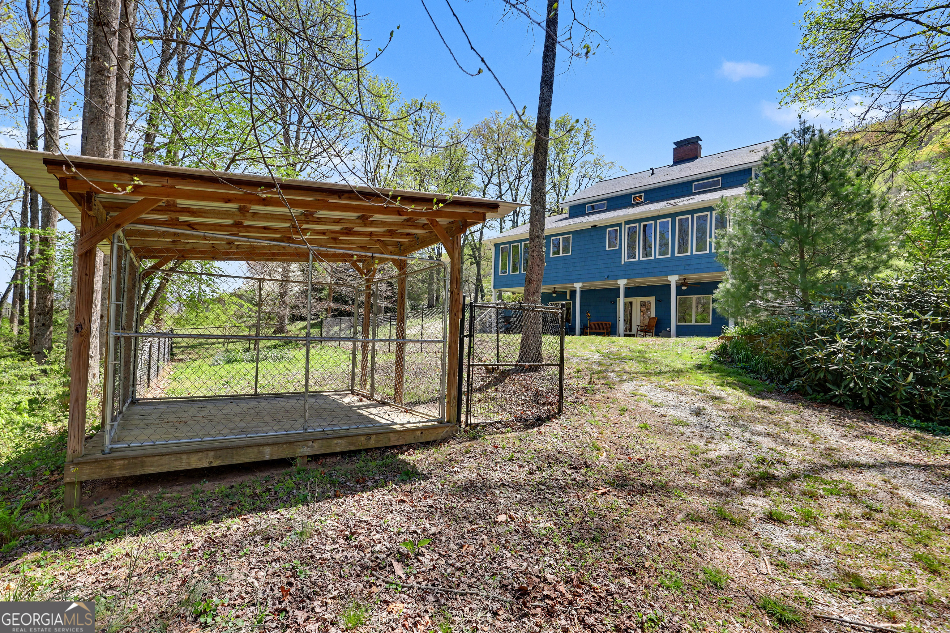 1067-o V Ov Justus Road Rabun Gap, GA 30568 - Photo 60 of 73 a view of house with backyard and outdoor seating