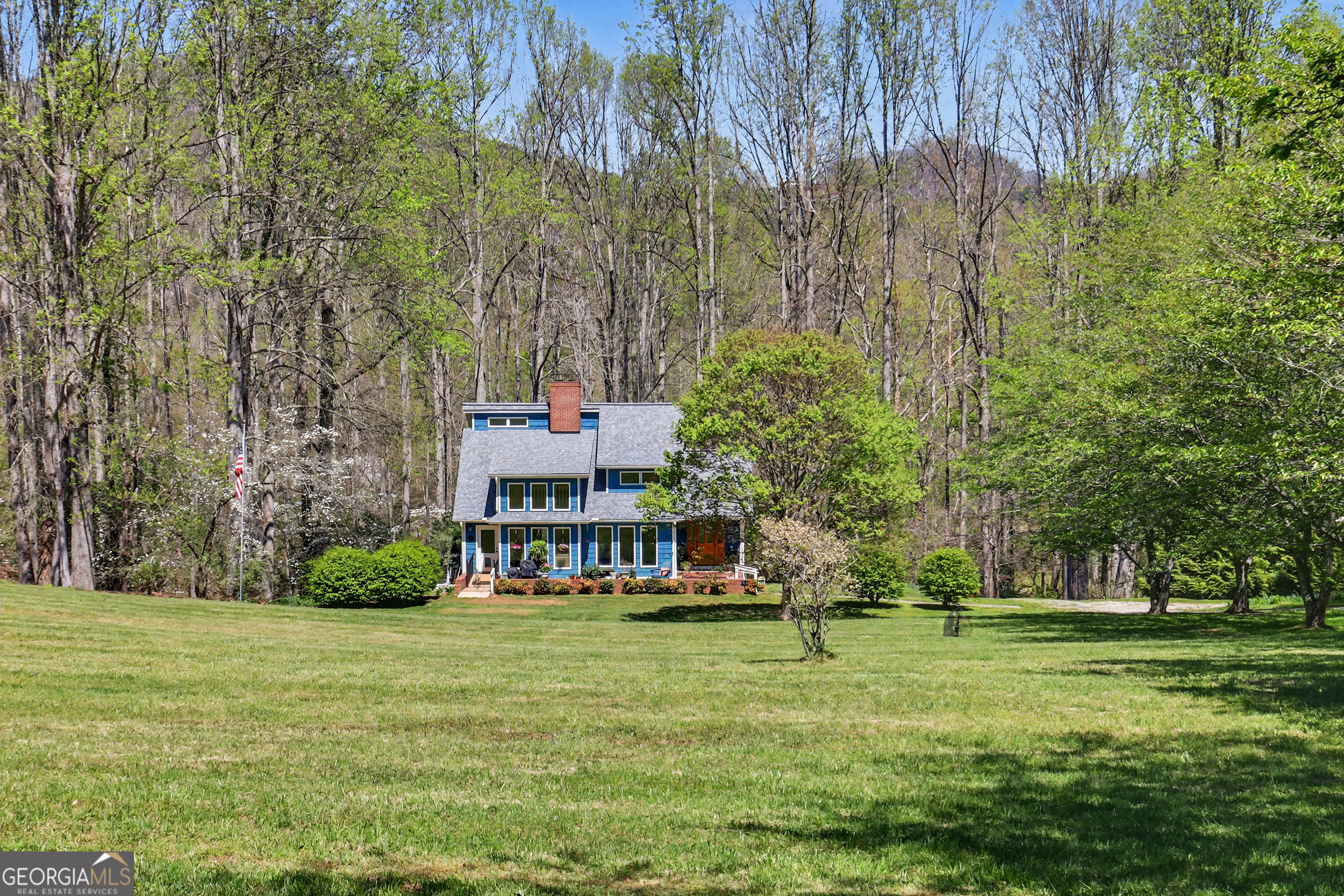 1067-o V Ov Justus Road Rabun Gap, GA 30568 - Photo 7 of 73 a view of a house with a big yard