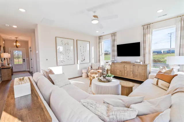 a bathroom with a bathtub and window
