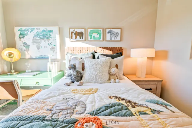 a bedroom with a bed and a couch