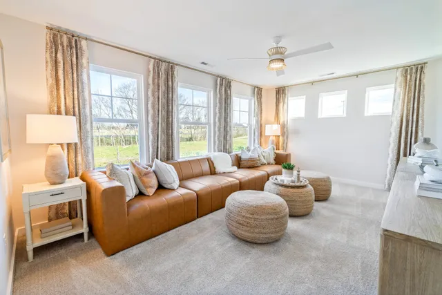 a view of a house with backyard porch and garden