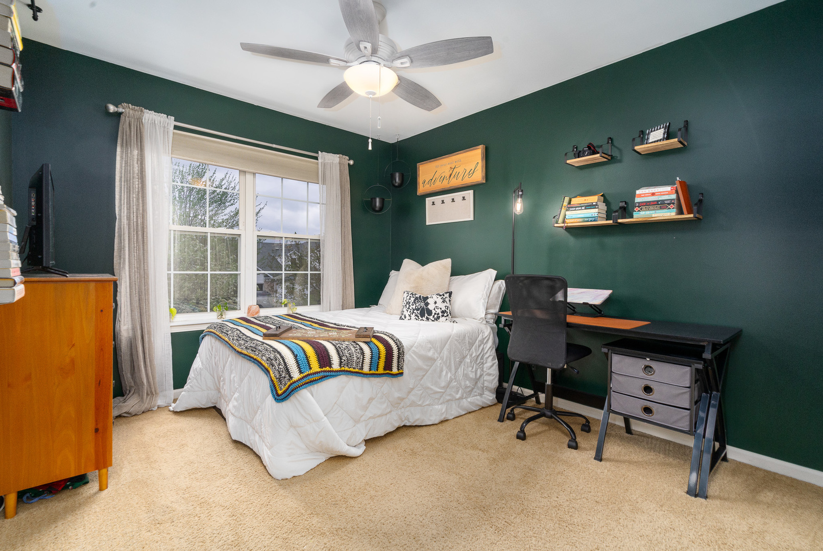 3626 Harms Road Joliet, IL 60435 - Photo 24 of 32 a bedroom with a bed dresser and a window