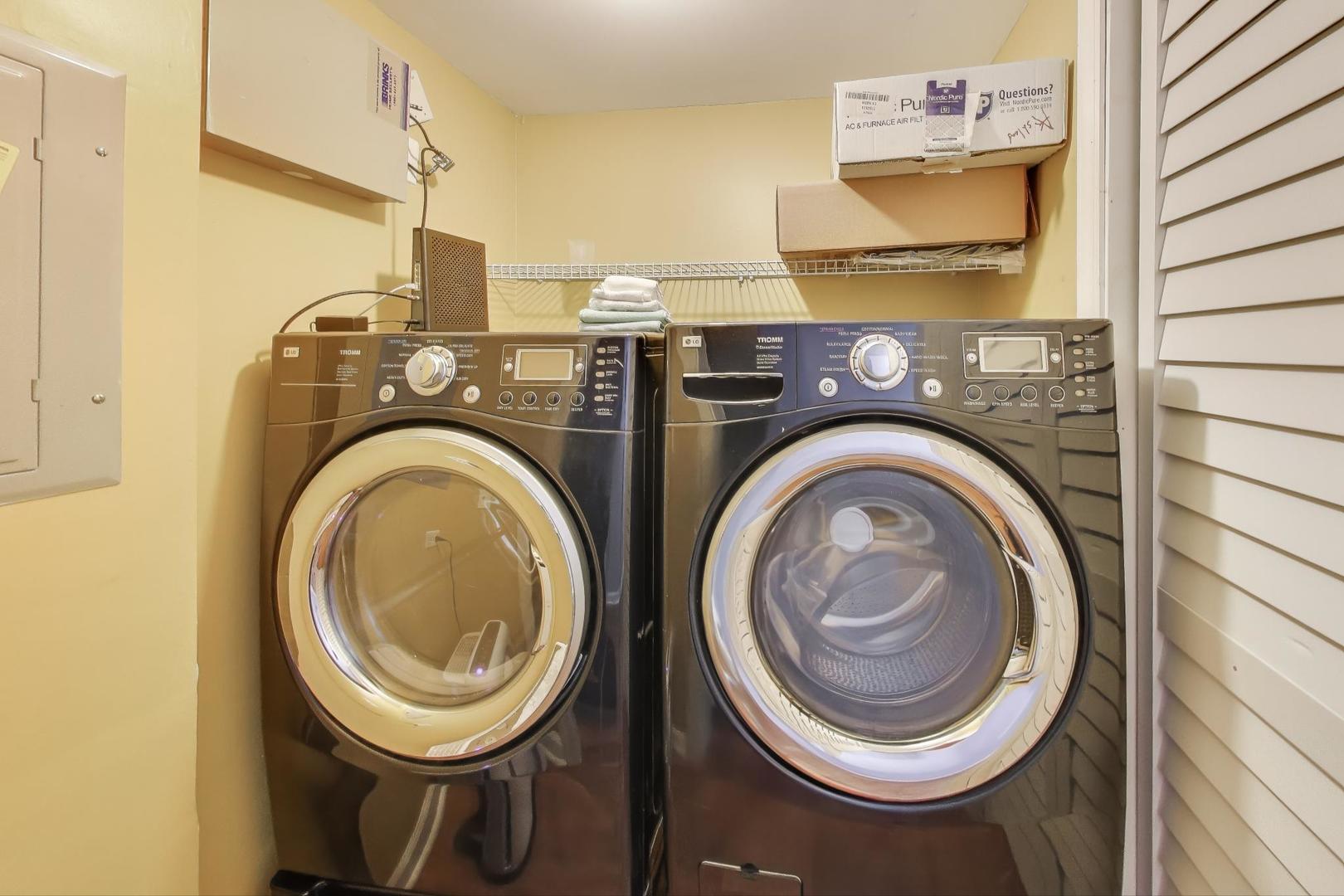 4212 North Ashland Avenue, Unit GS Chicago, IL 60613 - Photo 14 of 16 a utility room with dryer and washer