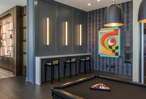 a view of a chairs and table in a room