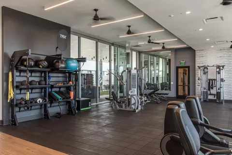 a workspace with furniture and a gate