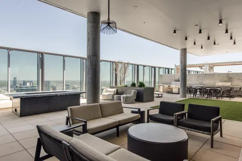a view of kitchen with furniture and staircase