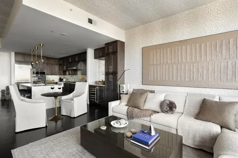 a living room with furniture and a couch