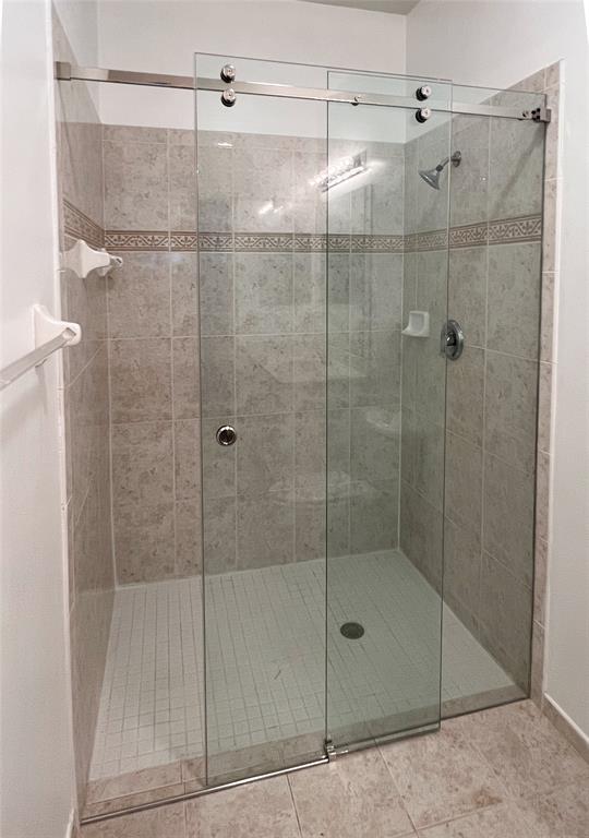 2904 Crestwood Terrace, Unit 4104 Margate, FL 33063 - Photo 19 of 21 a bathroom with a shower