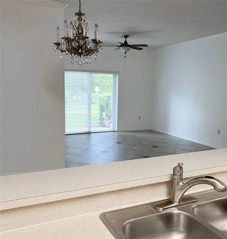a bath room with a toilet a sink and a bath tub