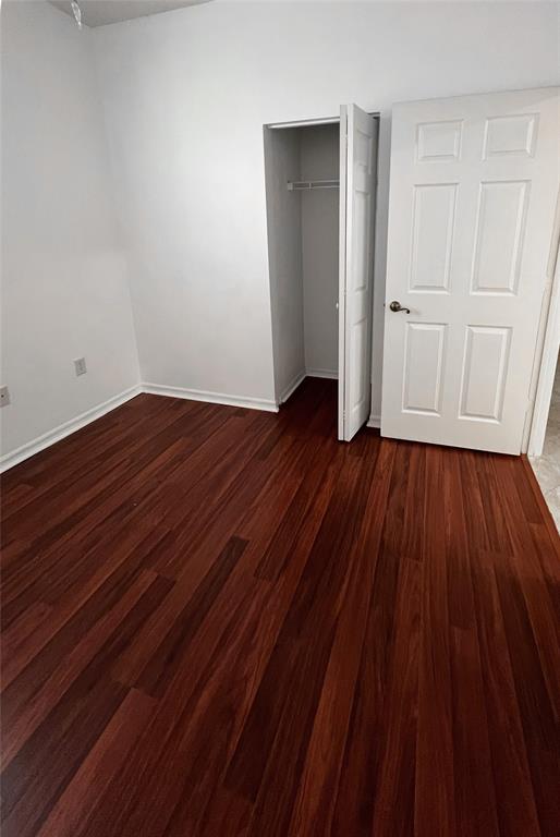 2904 Crestwood Terrace, Unit 4104 Margate, FL 33063 - Photo 8 of 21 a view of an empty room with wooden floor and closet