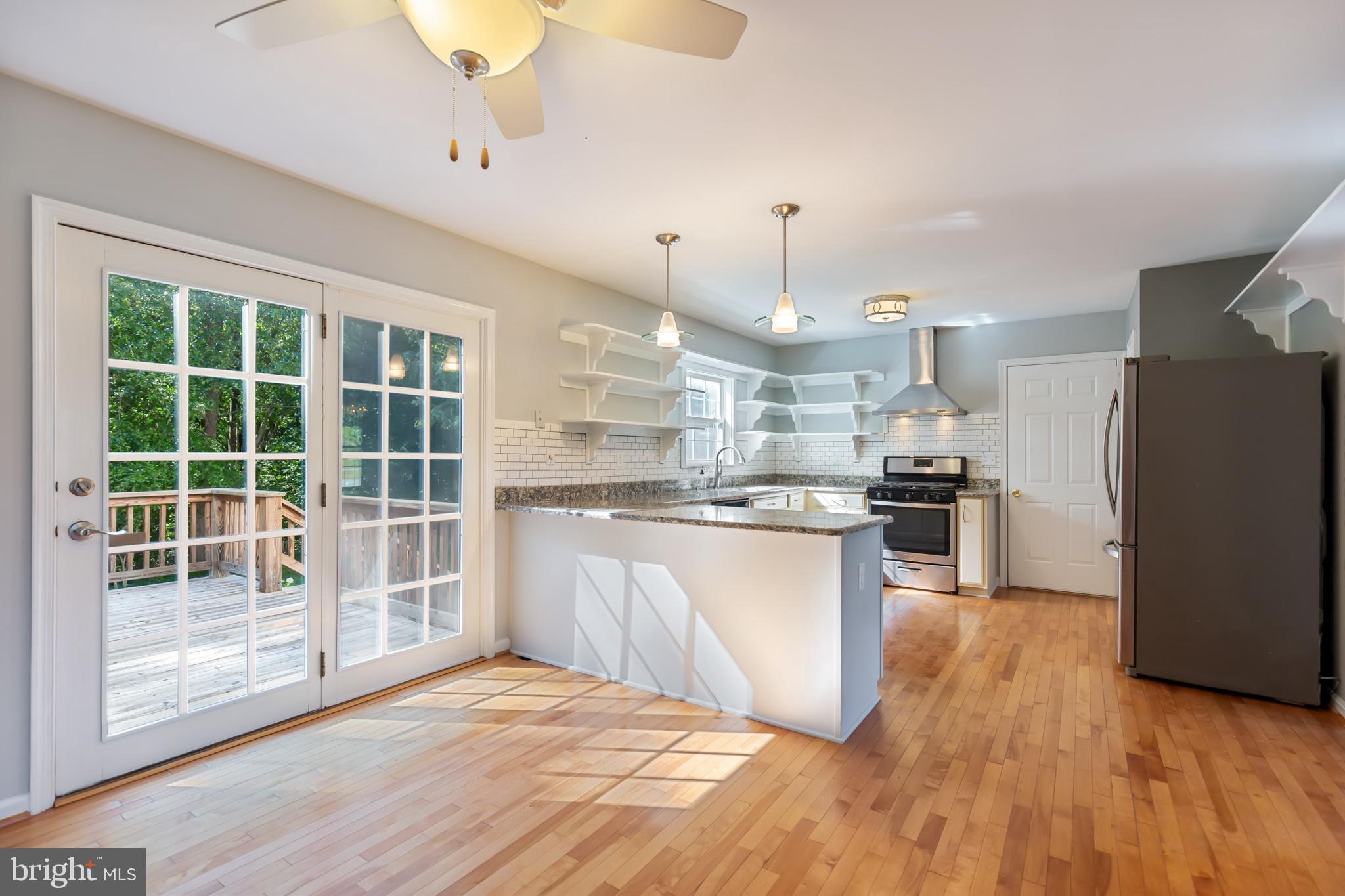 8140 Simpson Farm Road Owings, MD 20736 - Photo 11 of 31 Gleaming birch wood floors throughout main level