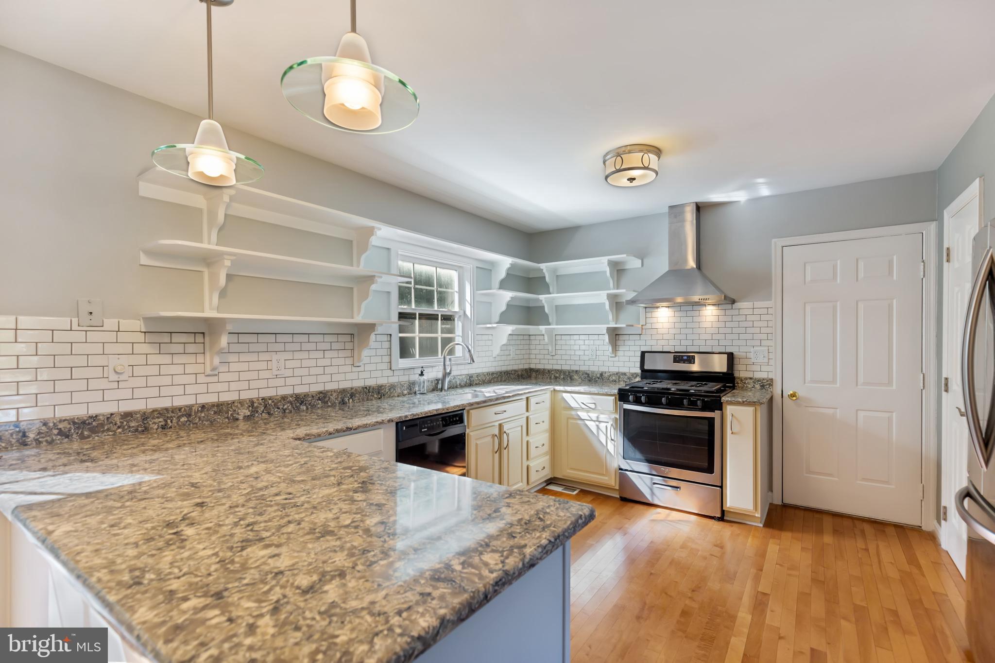8140 Simpson Farm Road Owings, MD 20736 - Photo 13 of 31 Granite counters and custom designed shelves