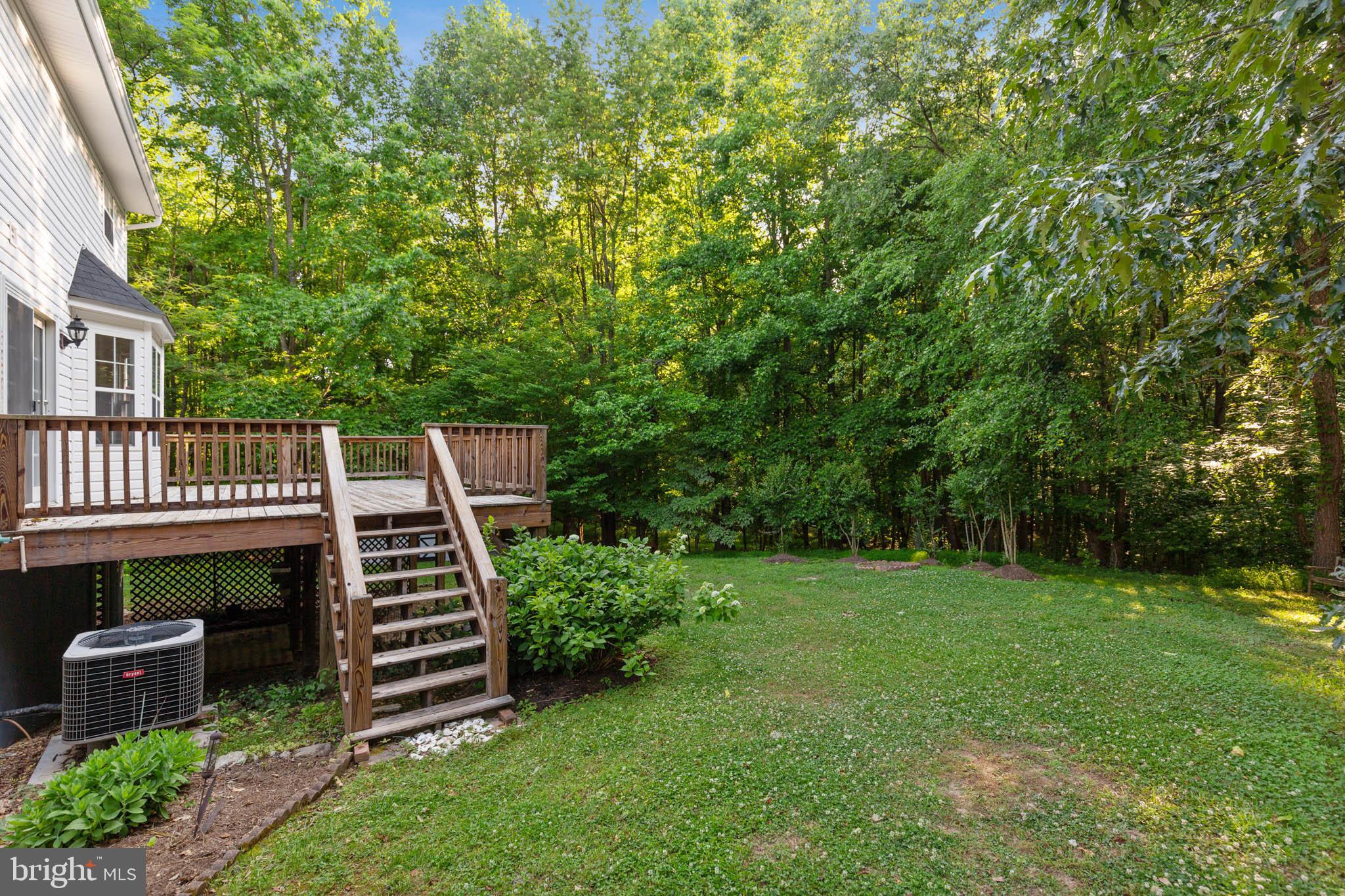8140 Simpson Farm Road Owings, MD 20736 - Photo 7 of 31 Backyard acreage with paths and creek in woods