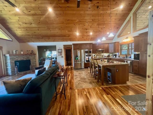 80 Grandview Loop Nebo, NC 28761 - Photo 11 of 42 a living room with stainless steel appliances kitchen island granite countertop furniture wooden floor and a kitchen view