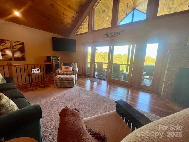 80 Grandview Loop Nebo, NC 28761 - Photo 12 of 42 a living room with furniture floor to ceiling window and wooden floor