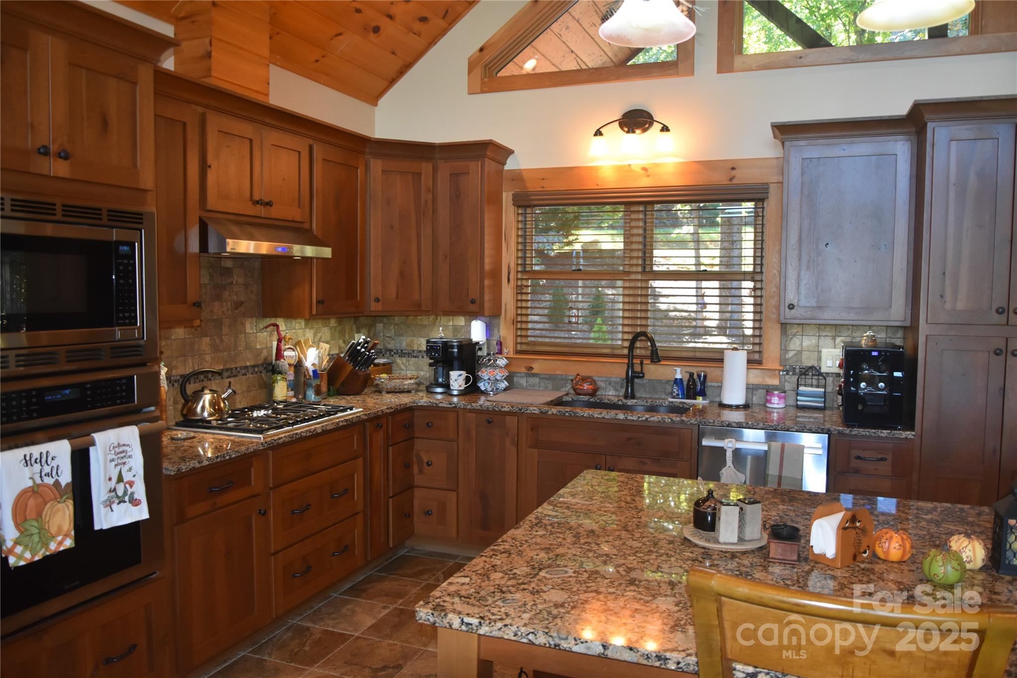 80 Grandview Loop Nebo, NC 28761 - Photo 15 of 42 a kitchen with sink a stove and cabinets