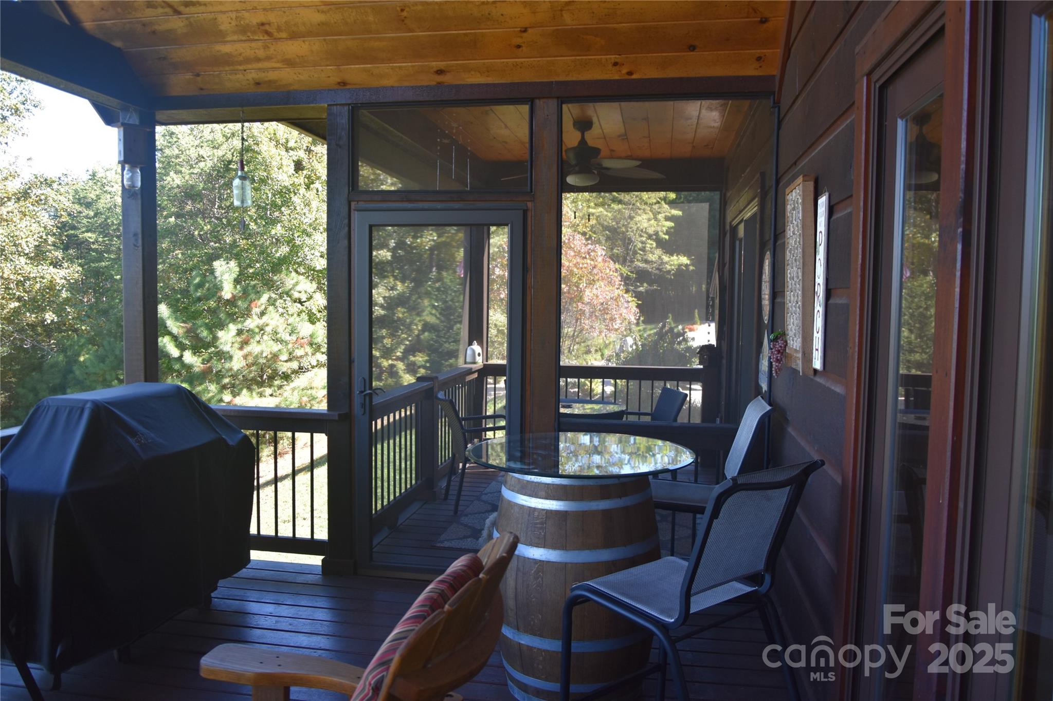 80 Grandview Loop Nebo, NC 28761 - Photo 17 of 42 a view of a porch with furniture and a yard