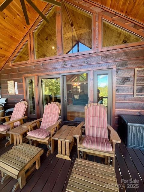 80 Grandview Loop Nebo, NC 28761 - Photo 18 of 42 a view of a patio with table and chairs and wooden floor