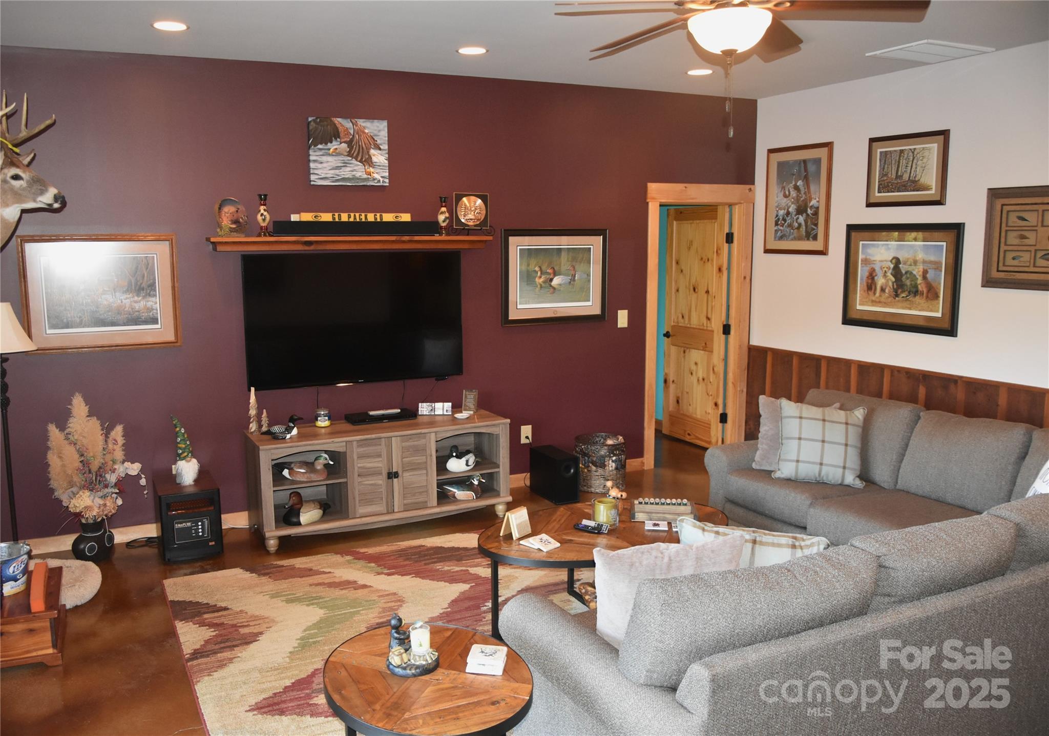 80 Grandview Loop Nebo, NC 28761 - Photo 25 of 42 a living room with furniture and a flat screen tv