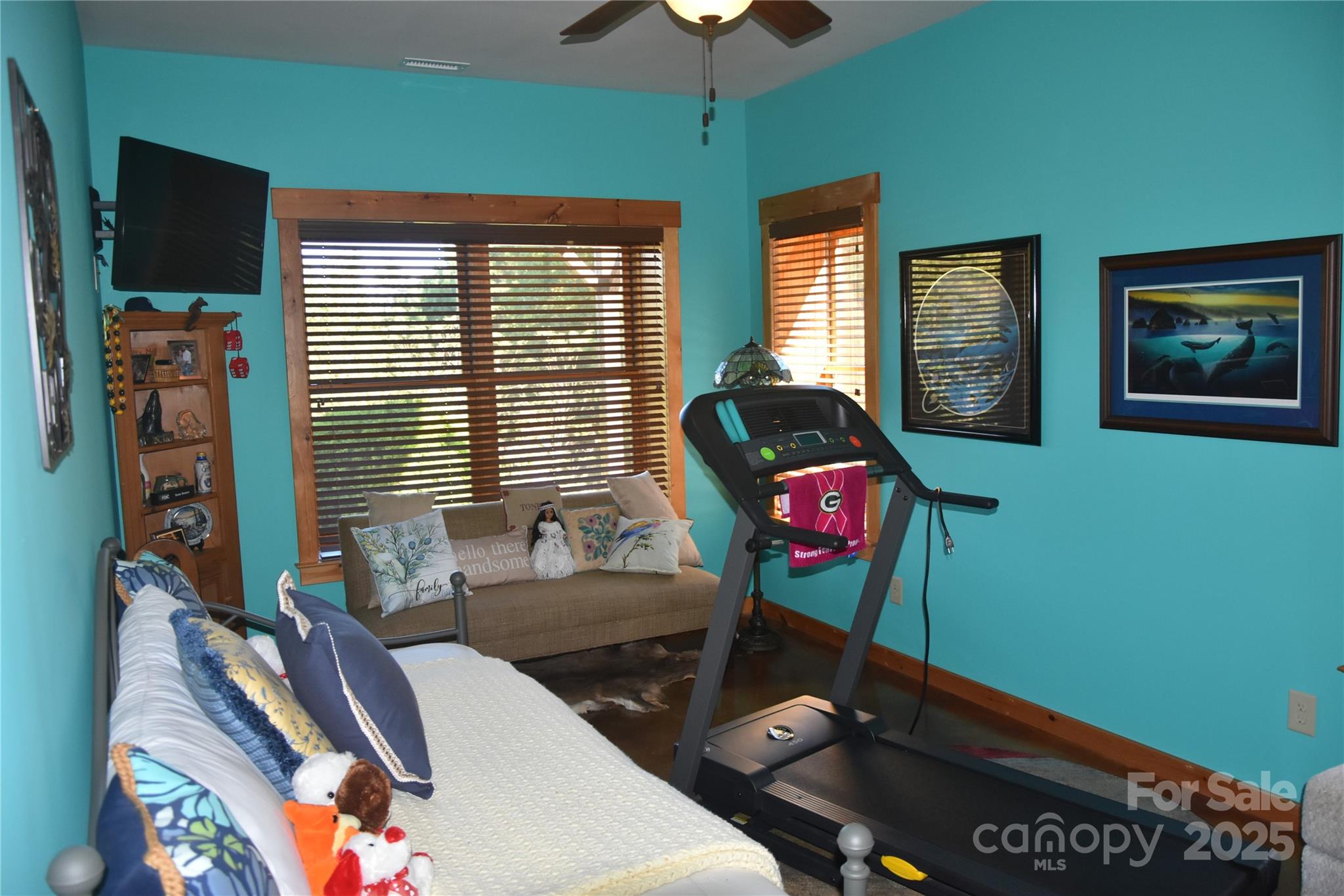 80 Grandview Loop Nebo, NC 28761 - Photo 31 of 42 a living room with furniture a window and a flat screen tv