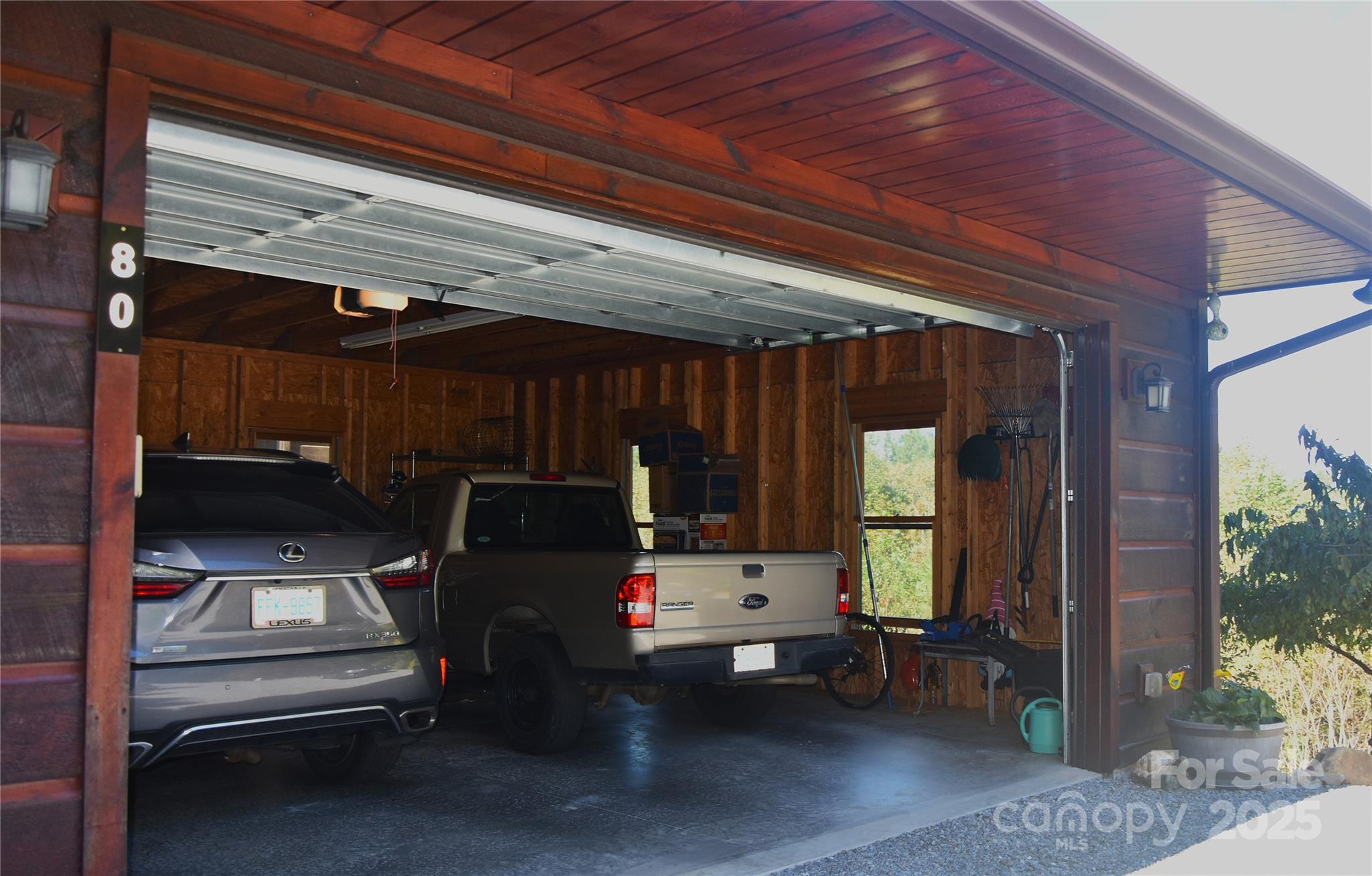 80 Grandview Loop Nebo, NC 28761 - Photo 4 of 42 a view of backyard with wheel chair and potted plants