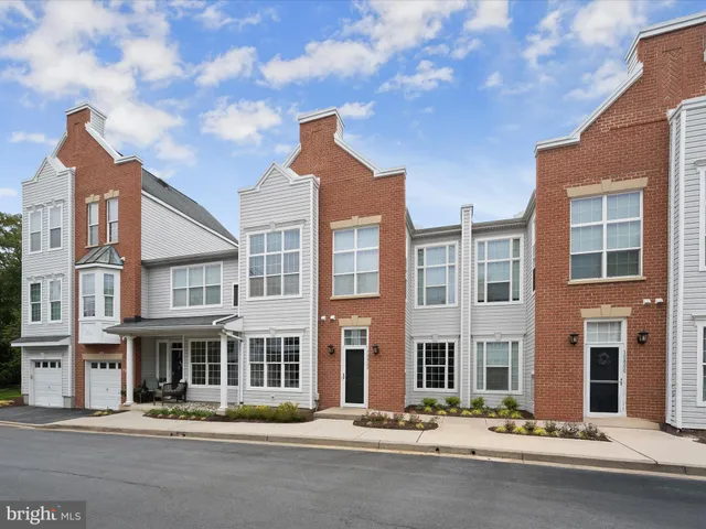a front view of building with street