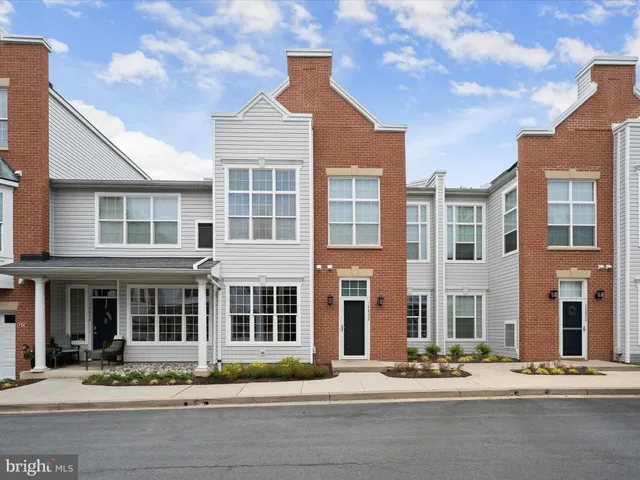 a view of a house with a parking space