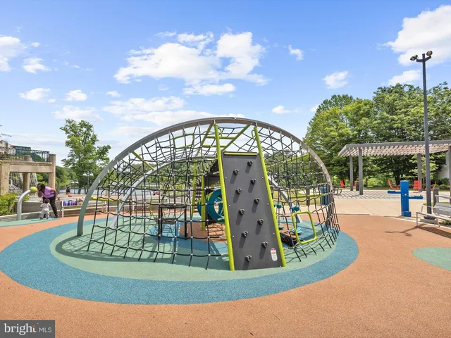 a view of a lake with furniture