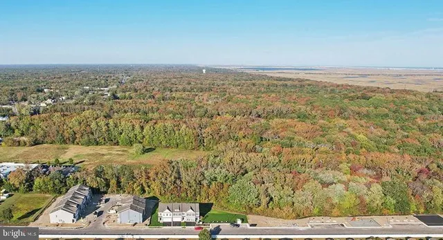 a view of a building with sitting area