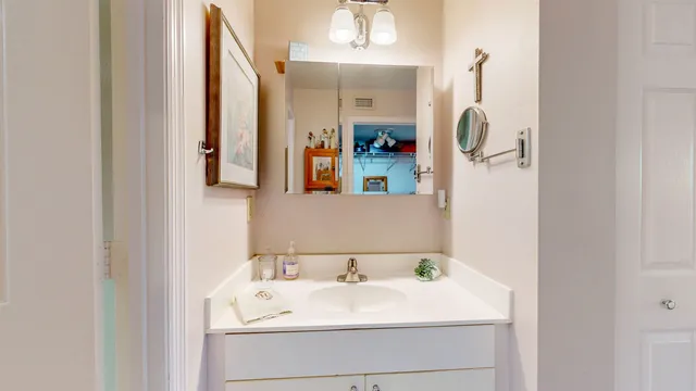 a bedroom with bed and wooden floor