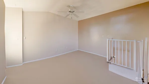 an aerial view of house with yard