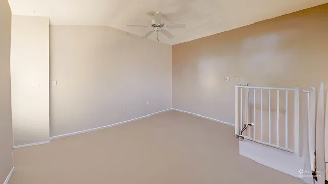 an aerial view of house with yard