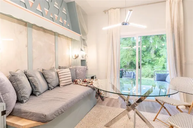 a living room with furniture and a table