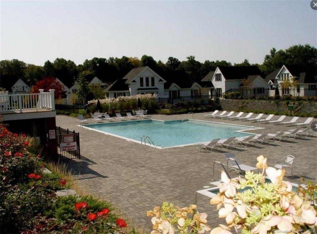 3 Banner Road, Unit 102 Moodus, CT 06469 - Photo 2 of 12 a front view of a house with a yard